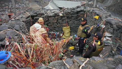 La Rinconada, Peru - March 5, 2026: Police Officers Visiting Miners Shrine Stock Footage 345134672