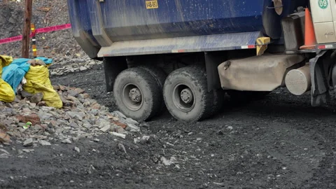 La Rinconada, Peru - March 5, 2026: Mining Dump Truck Struggling on Rough Road Stock Footage 345135701