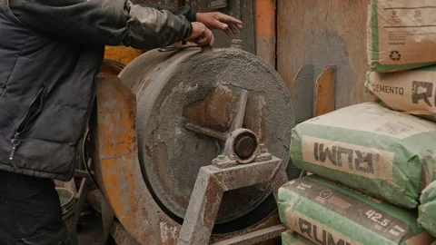 La Rinconada, Peru - March 5, 2026: Mine Worker Opening Gold Ore Mill Stock Footage 345135874