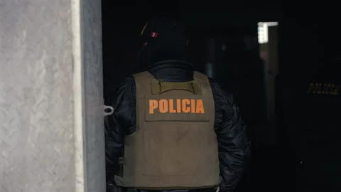 La Rinconada, Peru - March 5, 2026: Police Officer Wearing Tactical Vest Peru Stock Footage 345424294
