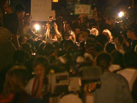 LA Riots 4-29-1992 Parker Center Protesters and American Flag Stock Footage 78200546