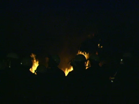 LA Riots 4-29-1992 Parker Center Guard Shack on Fire Police in Foreground Stock Footage 78215965