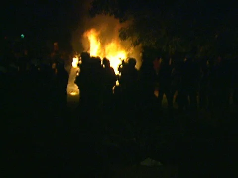 LA Riots 4-29-1992 Parker Center Guard Shack on Fire Police in Foreground Stock Footage 78216287