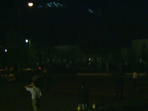 LA Riots 4-29-1992 Parker Center Crowd moves down street things thrown at Police Stock Footage 78216350