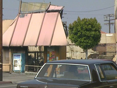 LA Riots 5-1-1992  Burned Out Building in South Central LA Stock Footage 78242606