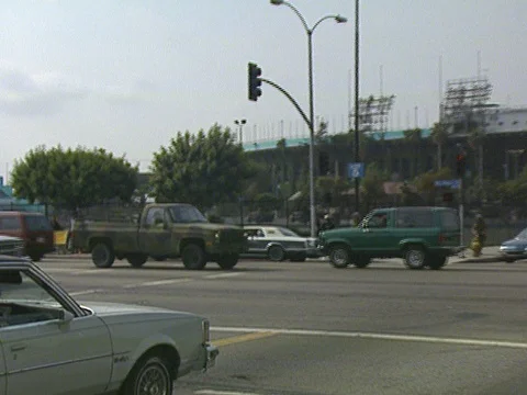 LA Riots 5-1-1992, National Guard Pickup Truck at LA Coliseum  Stock Footage 78243108