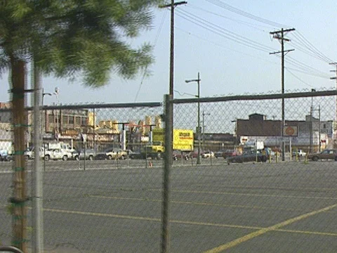 LA Riots 5-1-1992, News Van in Front of Burned Out Building Stock Footage 78244976