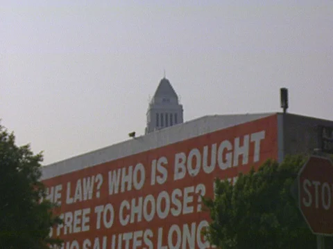 LA Riots 5-1-1992, Downtown Los Angeles MOCA "Who is Beyond the Law Mural" Stock Footage 78245084