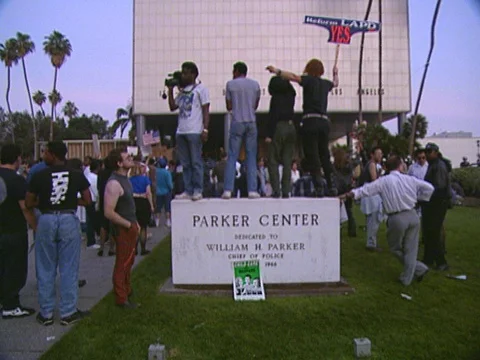 LA Riots Protesters standing on Parker Center Sign at LAPD Headquarters Stock Footage 75286456