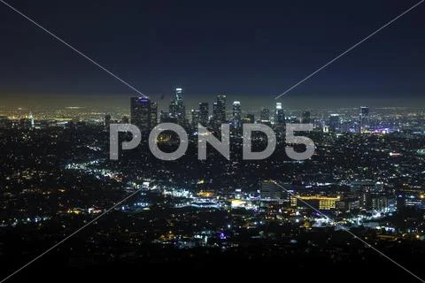 LA Skyline at Nighttime from afar Stock Photos