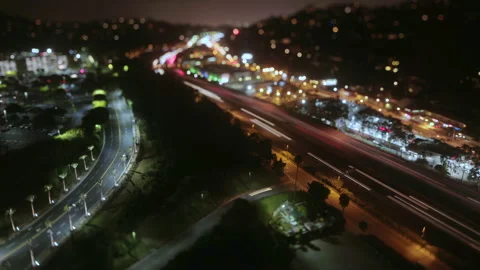 LA tilt-shift timelapse over 101 freeway near Universal Stock Footage 136444220