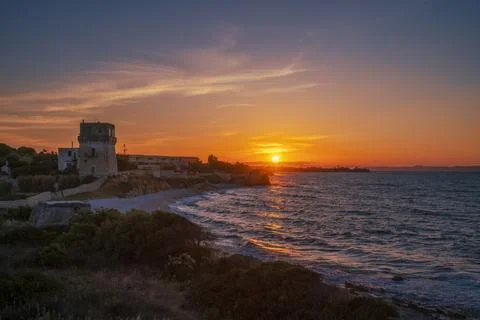 La Torretta beach at sunset (Apulia, Italy) Stock Photos