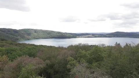 Laacher See in late summer with clouds rushing in Stock Footage 345150648