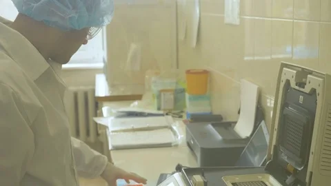 The lab assistant conducts analyzes. Antidote search Stock Footage 85272202