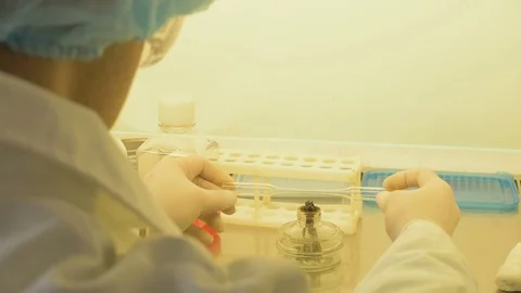 The lab assistant conducts analyzes. Antidote search Stock Footage 85273671