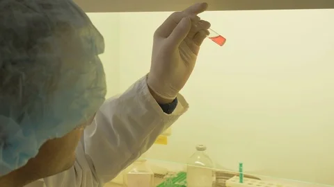  the lab assistant conducts analyzes. Antidote search Stock Footage 85278619
