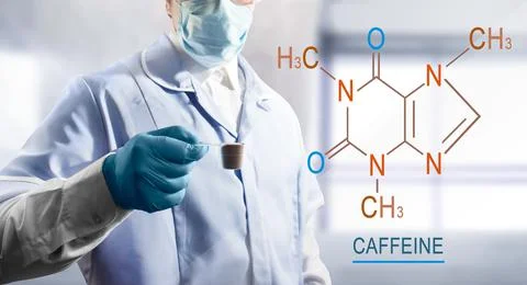 Lab assistant holding a coffee. Stock Photos