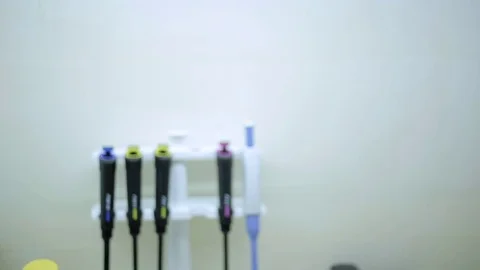 Lab assistant with rack of blood test Stock Footage 75907700