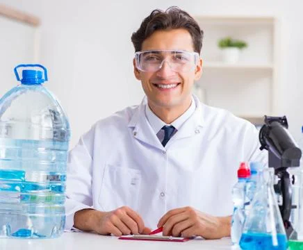 Lab assistant testing water quality Stock Photos