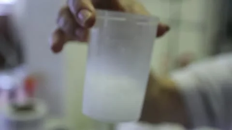 Lab Beakers - mixing Stock Footage 22253802