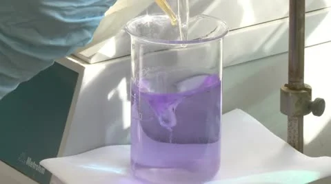 Lab Beakers - mixing Stock Footage 22254982