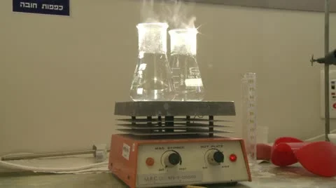 Lab Beakers - mixing Stock Footage 22255584