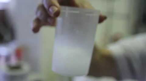 Lab Beakers - mixing Stock Footage 22256215