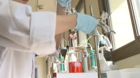 Lab Beakers - mixing Stock Footage 22280364
