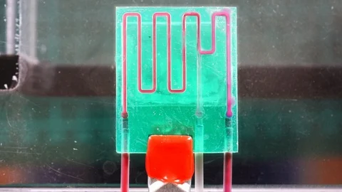 A lab-on-a-chip (LOC) is integration device with several laboratory functions 動画素材 94738770
