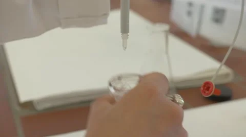 Lab drops into test tube solution 4K Stock Footage 66292842