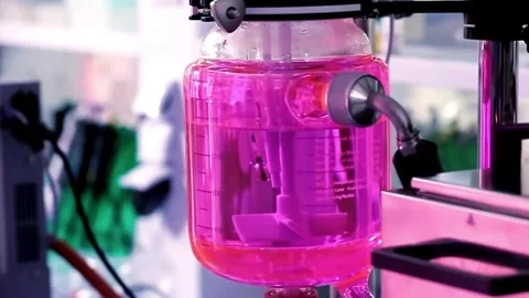 Lab experiment in glass flask Stock Footage 276159635