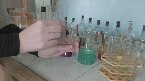 Lab experiment in test tubes. Chemical test tubes. Stock Footage 86232887