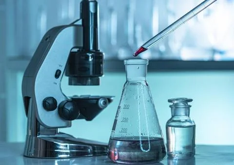 Lab glassware microscope arrangement. High quality photo lab glassware mic... Stock Photos