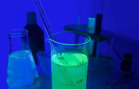 Lab glowing bottles composition. Foto stock