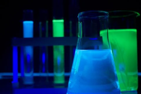 Lab glowing bottles. Stock Photos
