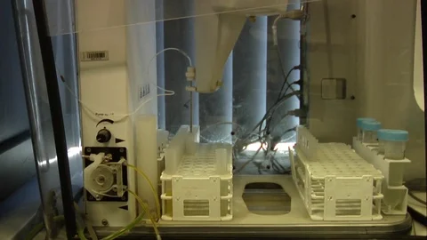 Lab machine performing analysis Stock Footage 70417600