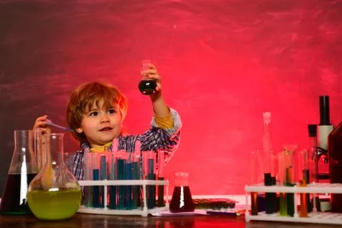 Lab microscope and testing tubes. First grade. Back to school and happy time Kid Stock Photos