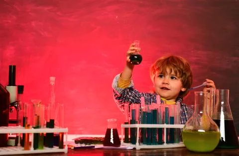 Lab microscope and testing tubes. First grade. Back to school and happy time Kid Stock Photos