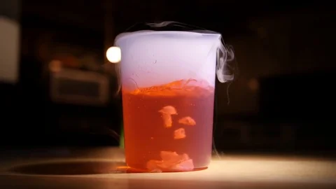Lab - Red Bubbly Beaker Left Rotation Stock Footage 77729513