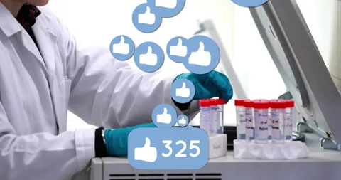 Lab research being animated showing technician handling test tubes with floating Stock Footage 307437185