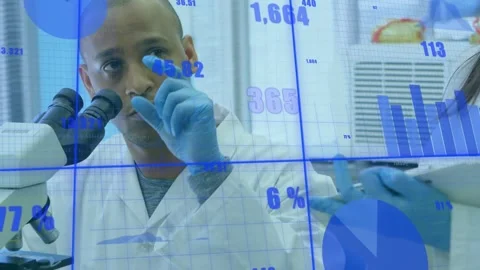 Lab researcher peering into microscope and updating overlay as peer scrolling Stock Footage 317869367