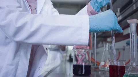 Lab scene with a scientist performing preparation for experiment Stock Footage 134333655