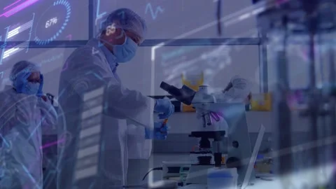 Lab scientist placing sample under microscope and starting live data analysis Stock Footage 332505365