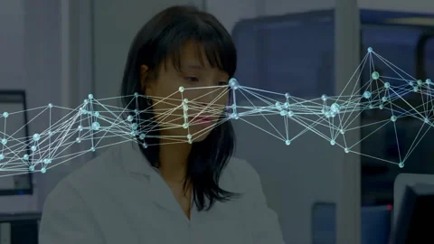 Lab scientist reaching into rack and lifting pink test tube examining sample Stock Footage 310433660