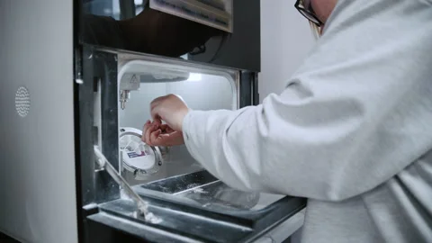 Lab Specialist Coating a Crown Pattern with Molten Wax Using a Видео 336627130