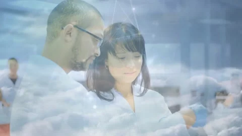 Lab team checking sample, woman blue-gloved handling and showing cloud node Video stock 330397366