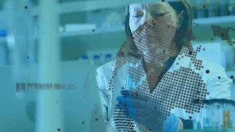 Lab tech grabbing vial, tilting and inspecting sample to confirm level under Stock Footage 330577929