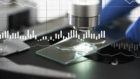 Lab tech hand pushing slide under scope aligning droplet while data overlays Stock Footage 335317093