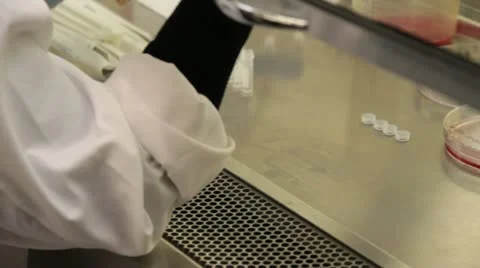 Lab tech injects sample test tubes Stock Footage 21936075