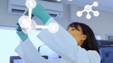 Lab tech picking multiwell plate, raising, checking wells for QC with molecules Stock Footage 335234971